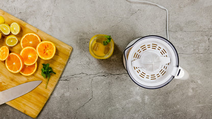 Ovente 34-oz Electric Citrus Juicer with 2 Auto-Reversing Cones JE1034W